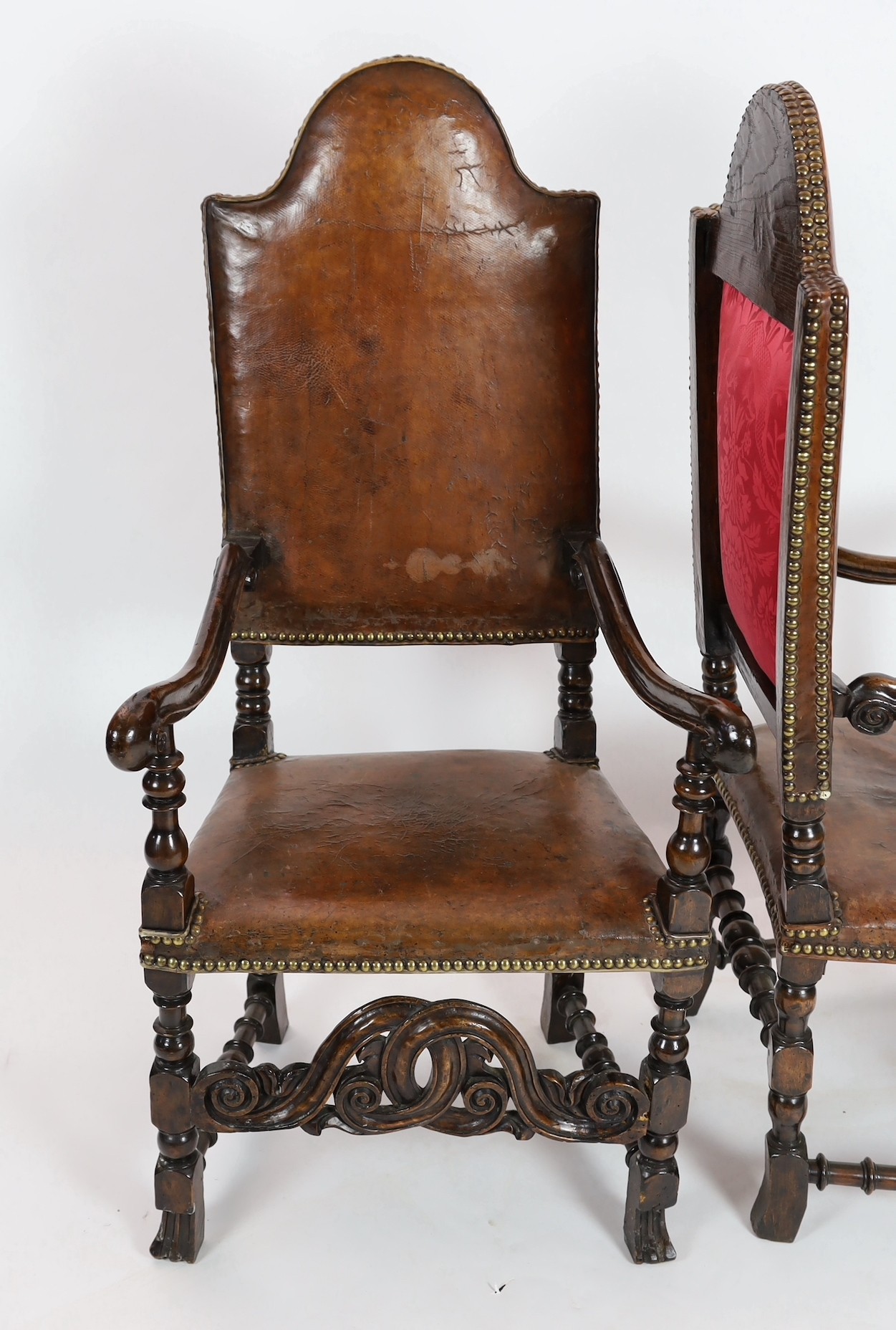 A pair of late 17th century Spanish walnut and elm armchairs, width 69cm, depth 61cm, height 141cm